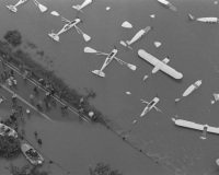 Planes at the Piper Aircraft Company in Lock Haven lie half-submerged by flood waters from the West Branch of Susquehanna River.