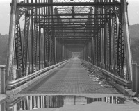 As the waters recede, a view into the interior of the Walnut Street Bridge looking west.